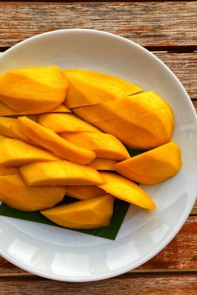 A close-up shot of freshly sliced mangoes